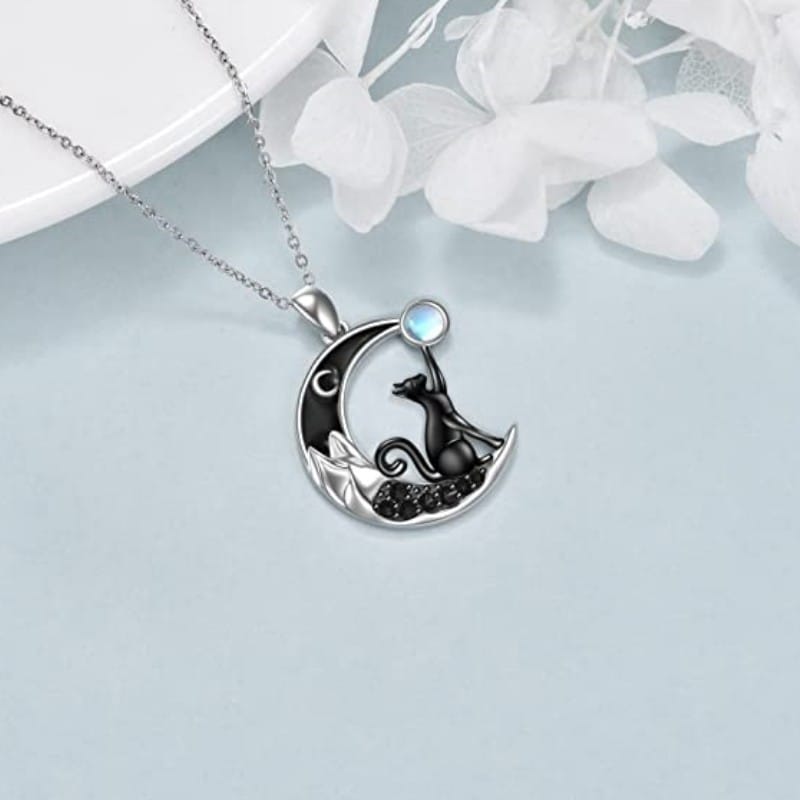 Moonchild's Mystique: Black Cat Crescent Moonstone Talisman Necklace