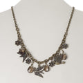 Antiqued Brass Bird Charms and Crystal Necklace